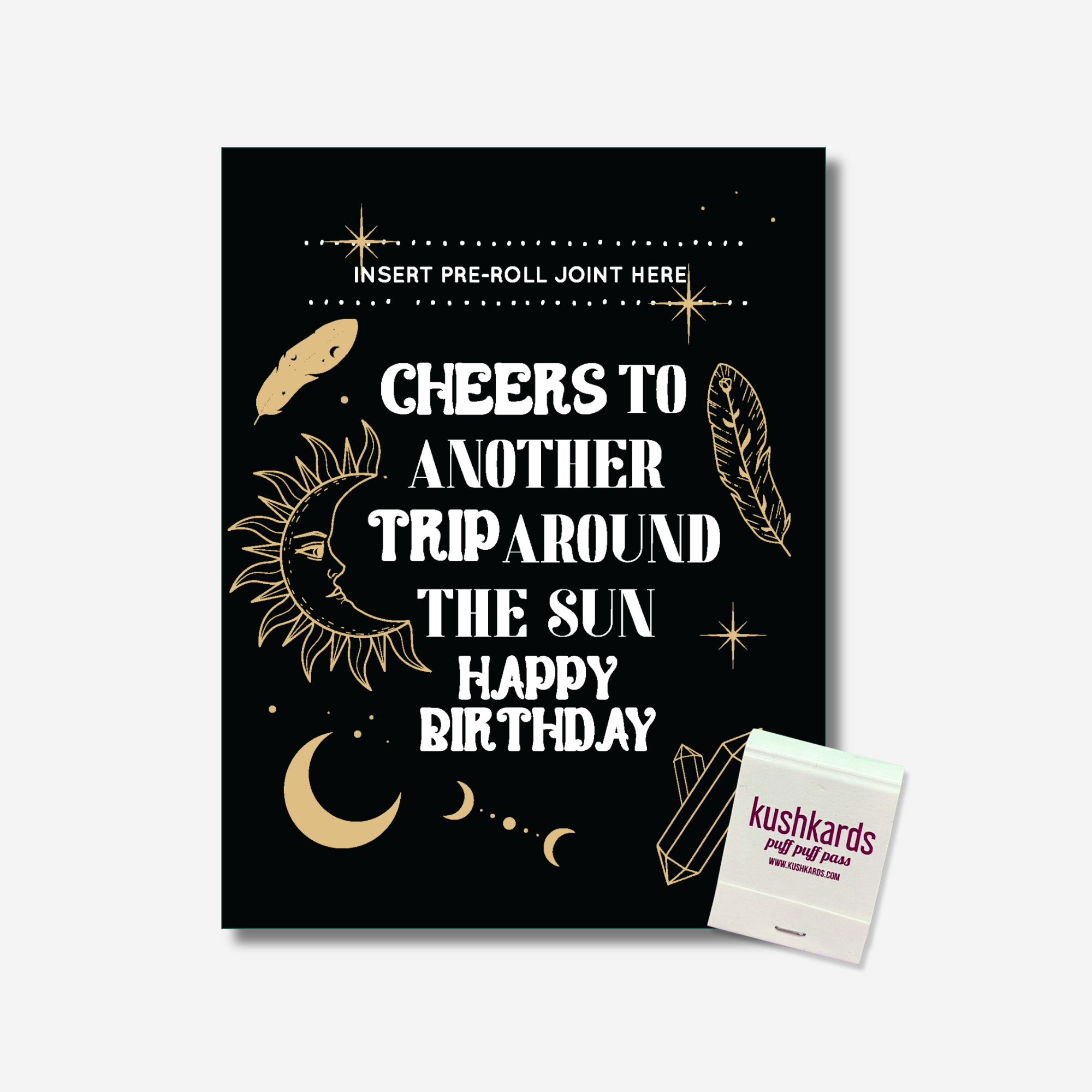 Celestial-themed birthday card with the text "Cheers to Another Trip Around the Sun Happy Birthday," featuring a slot to insert a pre-rolled item, with an included matchbook displaying the brand name "KushKards puff puff pass."