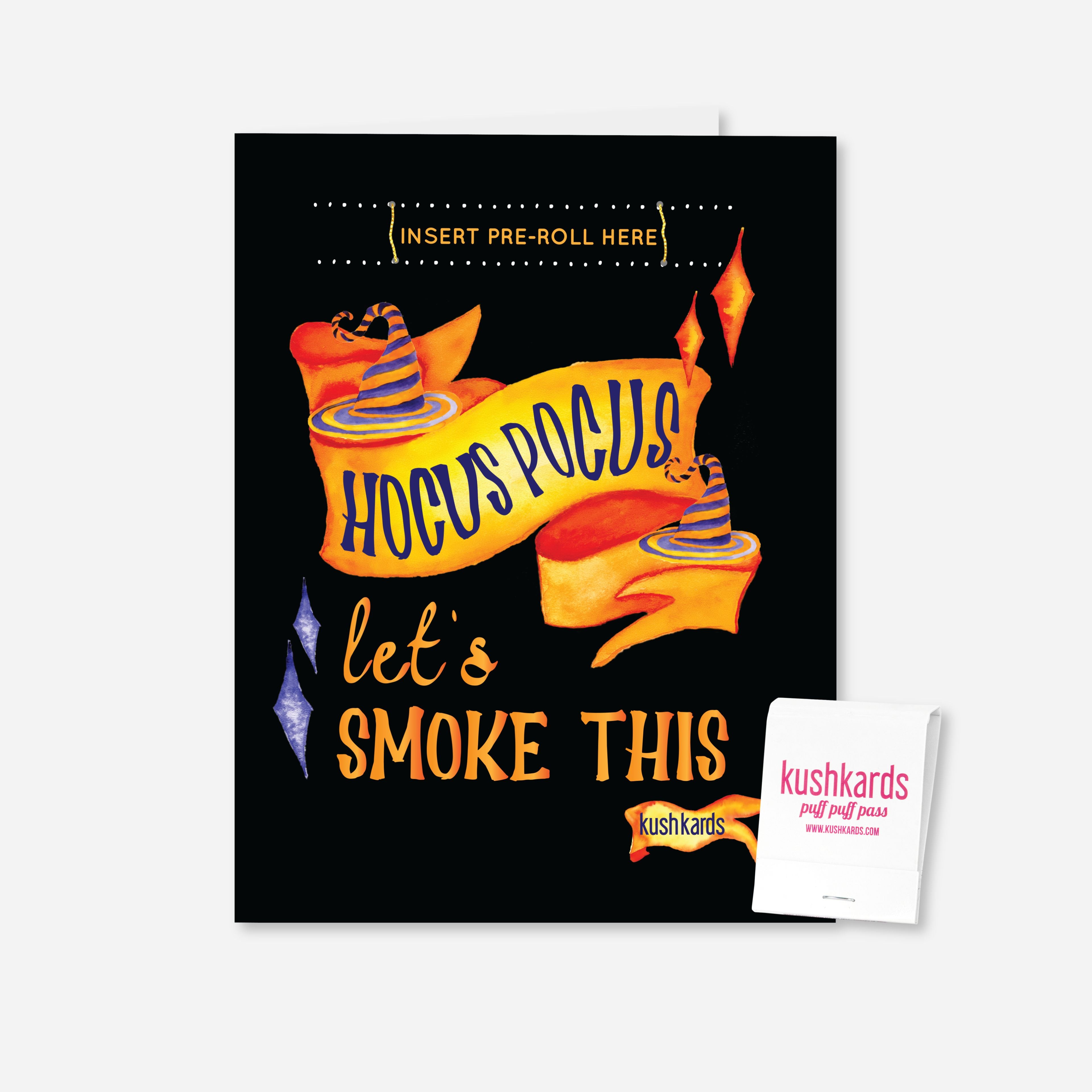 A black greeting card with orange and purple text saying "Hocus Pocus let&