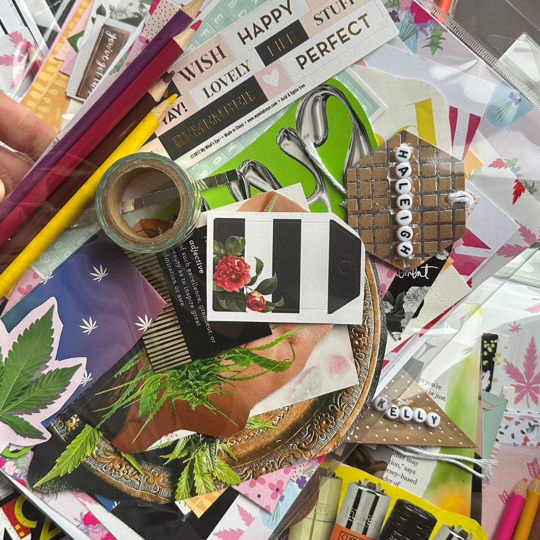 Image of stationery subscription pack wit color pencils , tape, magazine scraps and a name tag with letter beads