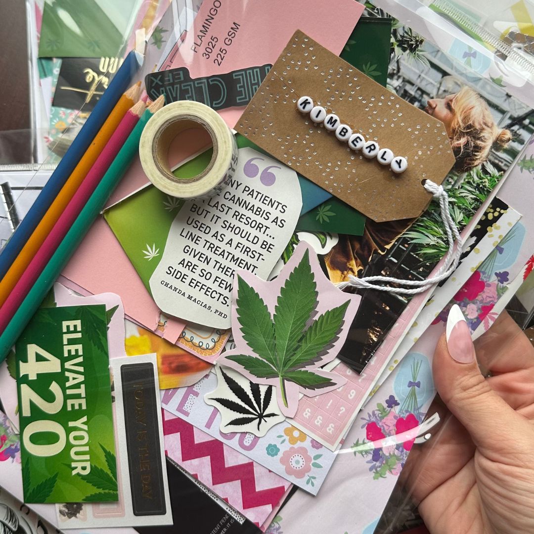 Image of stationery subscription pack wit color pencils , tape, magazine scraps and a name tag with letter beads