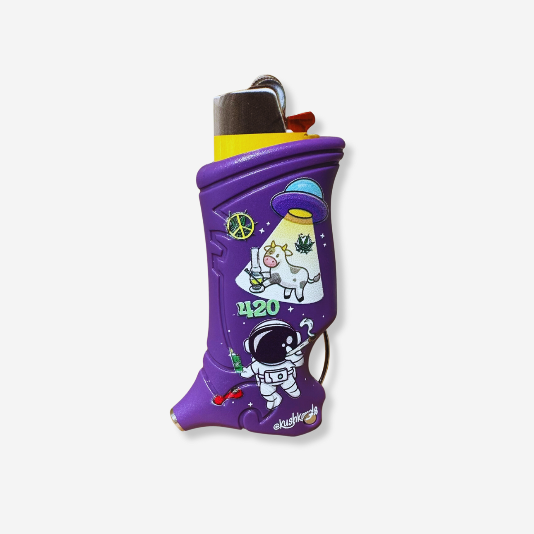 420-themed UFO Cow Toker Poker lighter case with an astronaut, cow, and cannabis leaves design.
