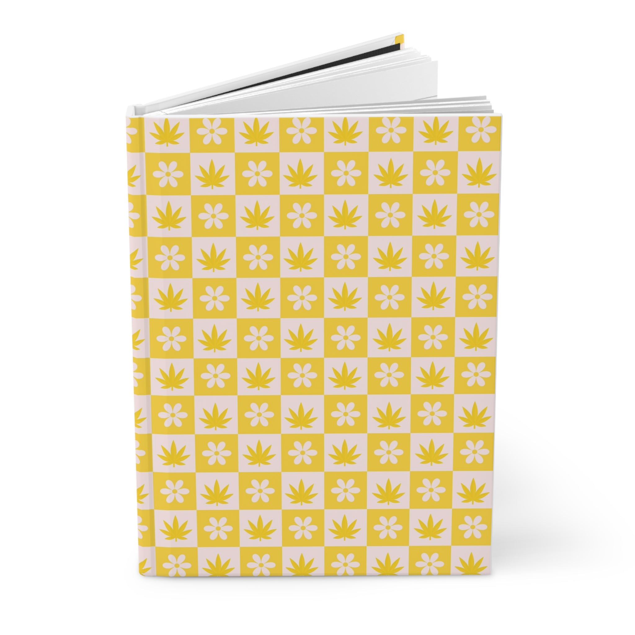 Retro checkerboard notebook with an alternating pattern of white daisies and yellow marijuana leaves on a white background