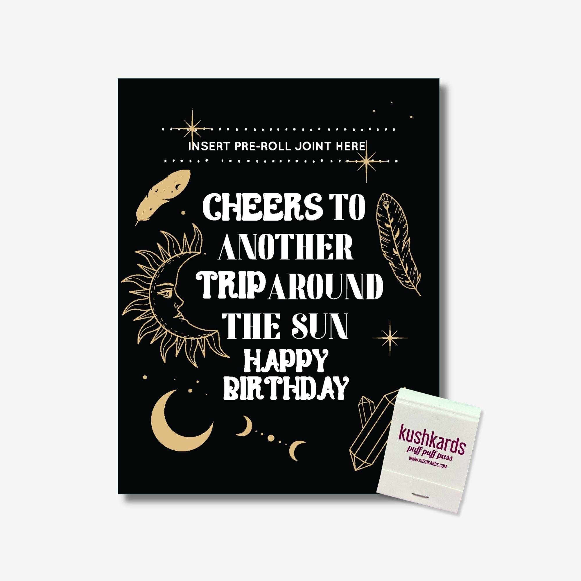 Cheers to another trip around the sun Happy Birthday" Celestial-themed greeting card on recycled paper with sun, moon, and crystal illustrations