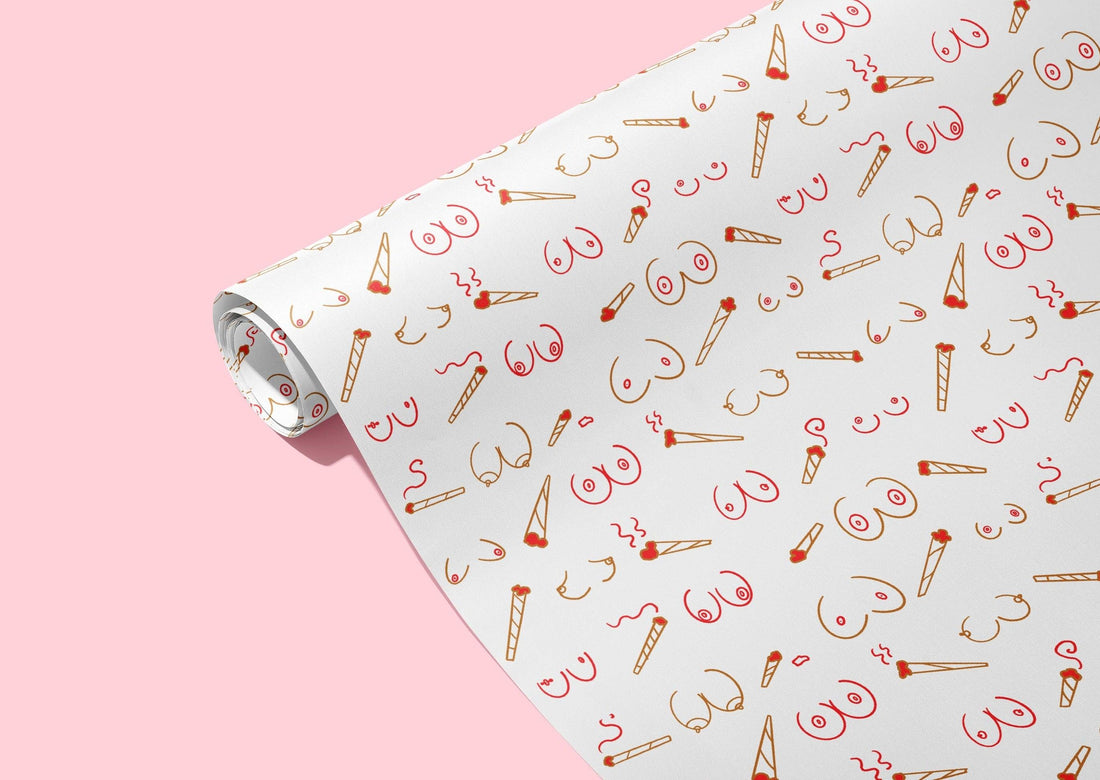 ♥️ Doobies and Boobies Naughty Wrapping Paper - KushKards that has 3 sheets per roll at 2" x 29" and have a print of doors and boobs