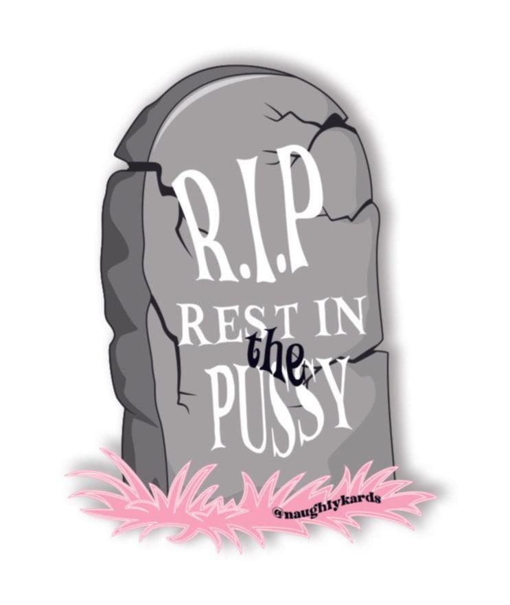 Tombstone-shaped matte sticker with "R.I.P. Rest In The Pussy" and pink grass at the base, adult humor.