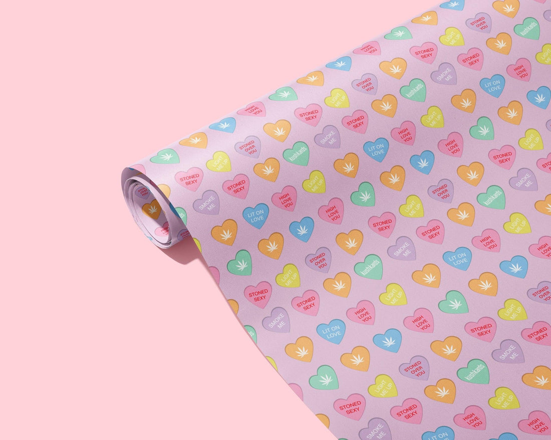 Stoner Sweeties Wrapping Paper - KushKards 22" x 29" wide and has 3 sheets per roll with cannabis themed sweat heart sayings
