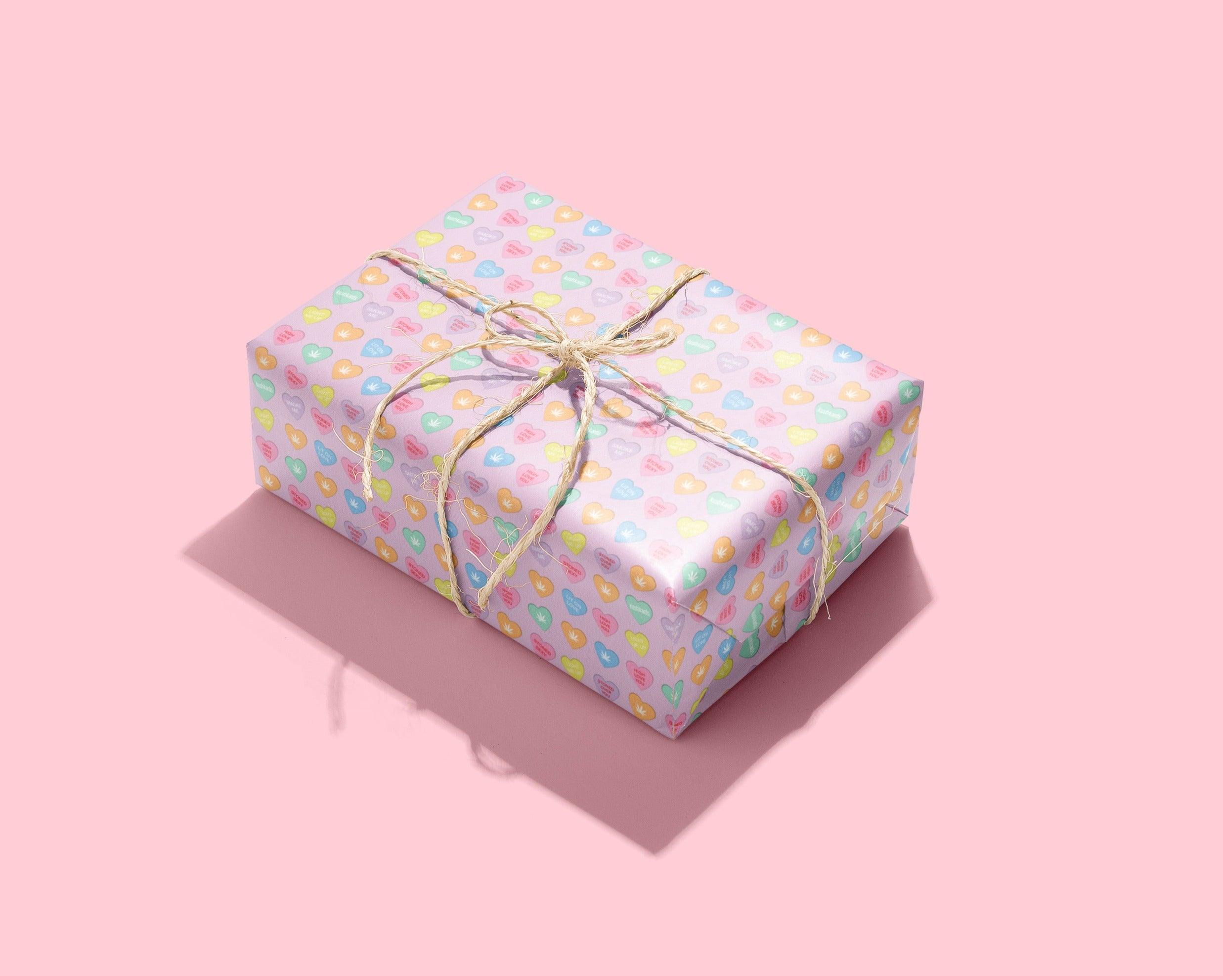 Stoner Sweeties Wrapping Paper - KushKards 22" x 29" wide and has 3 sheets per roll with cannabis themed sweat heart sayings