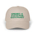 Beige cap with green text &