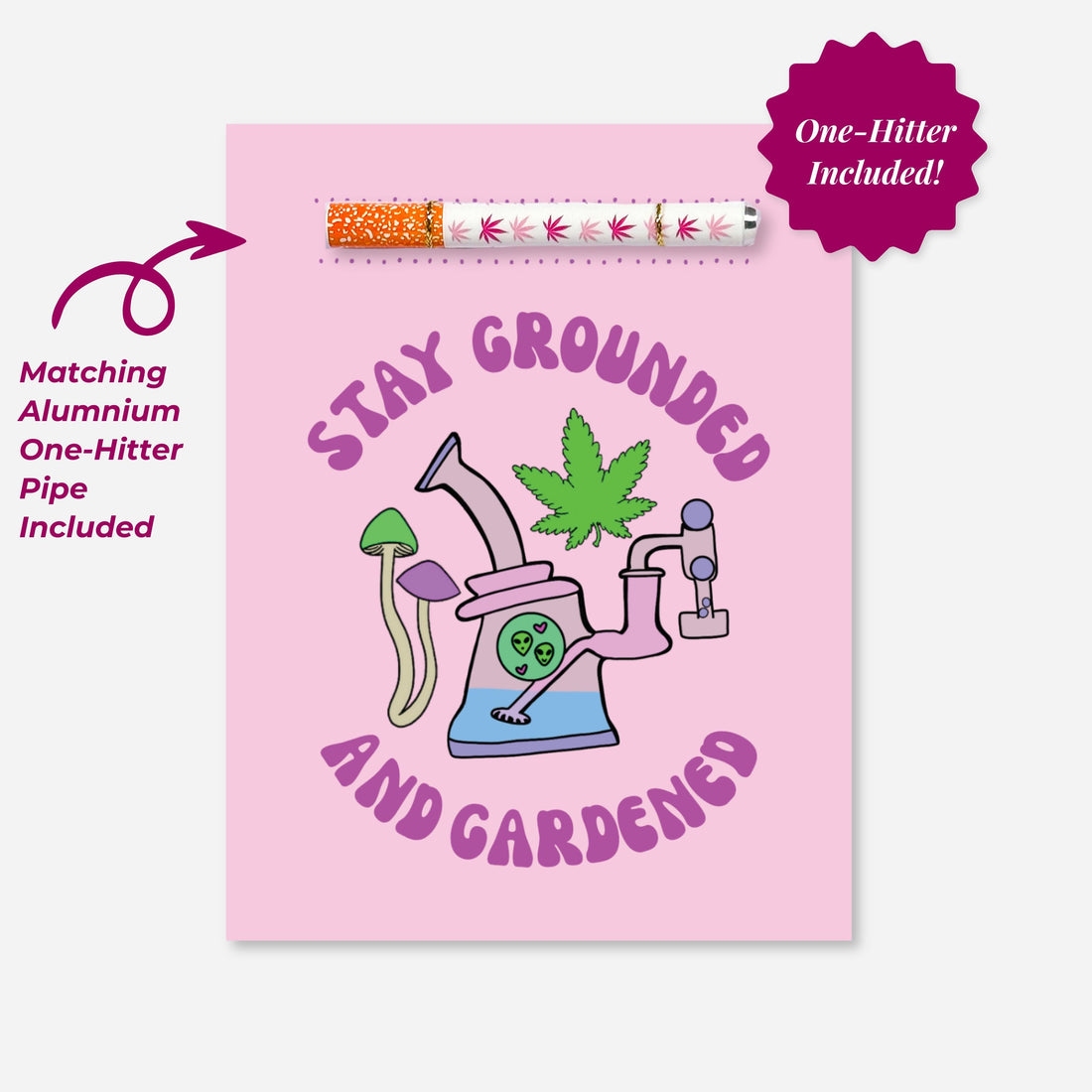 Pink cannabis-themed card with a one-hitter pipe included and artwork featuring mushrooms, a leaf, and alien in a bong. Text reads “Stay Grounded and Gardened.” Collaboration with A Psychedelic Mood.
