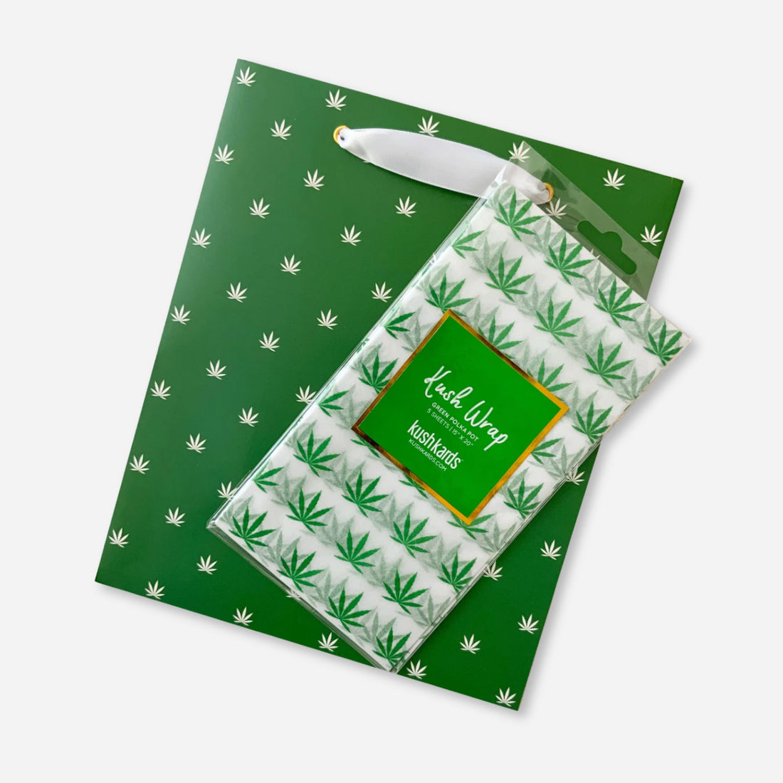 Green gift bag and matching green pot leaf tissue paper combo set, perfect for elevated cannabis-themed gifting.