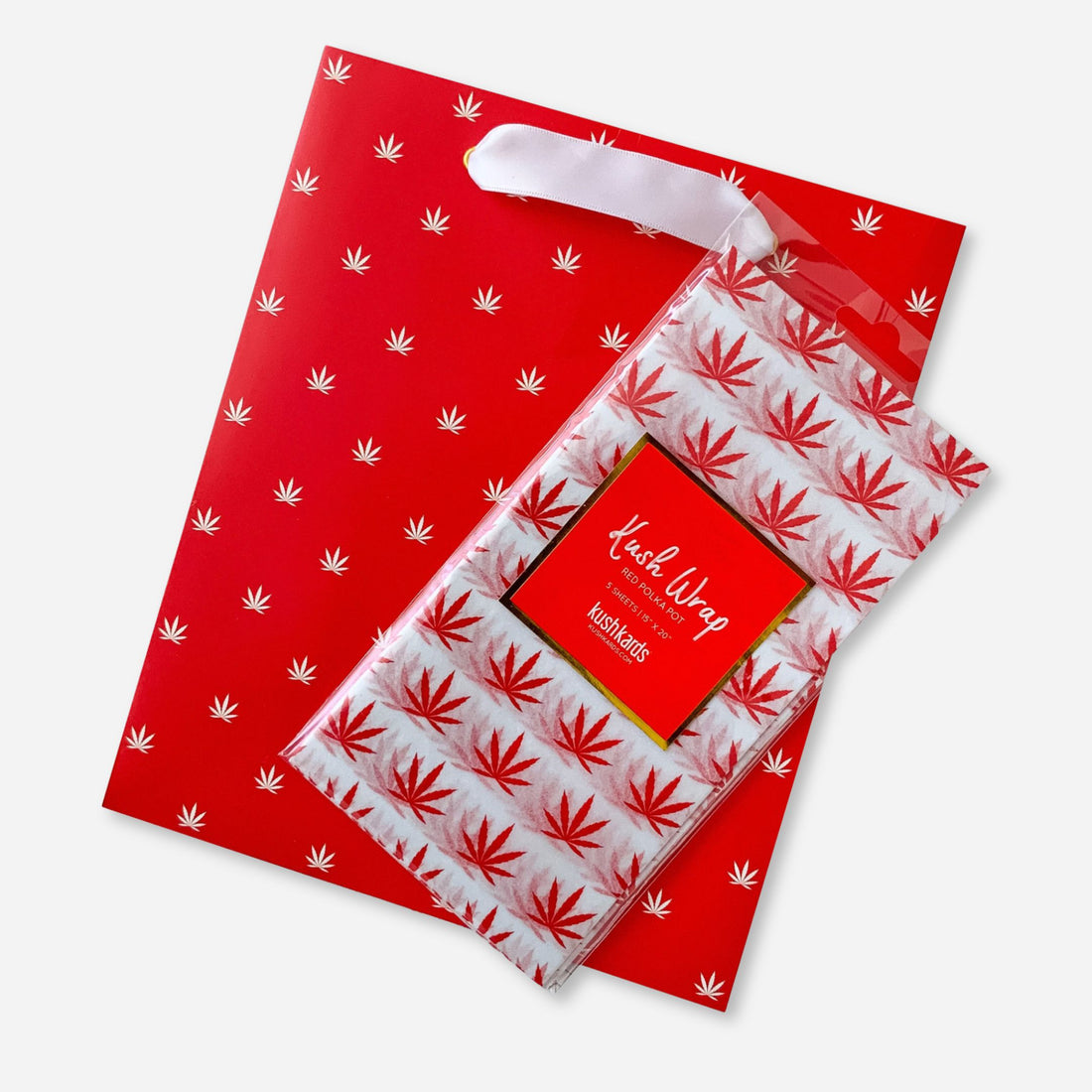 Red gift bag and matching red pot leaf tissue paper combo set, perfect for elevated cannabis-themed gifting
