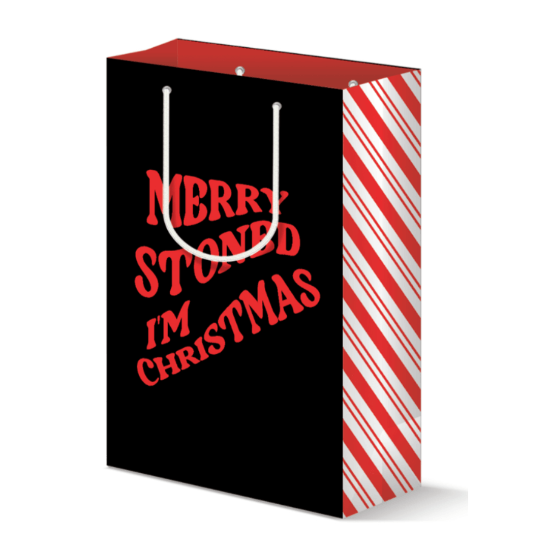 Large black gift bag with humorous 'Merry Stoned I'm Christmas' in red lettering and a festive candy cane stripe down the side, perfect for wrapping holiday presents with a touch of fun and laughter.