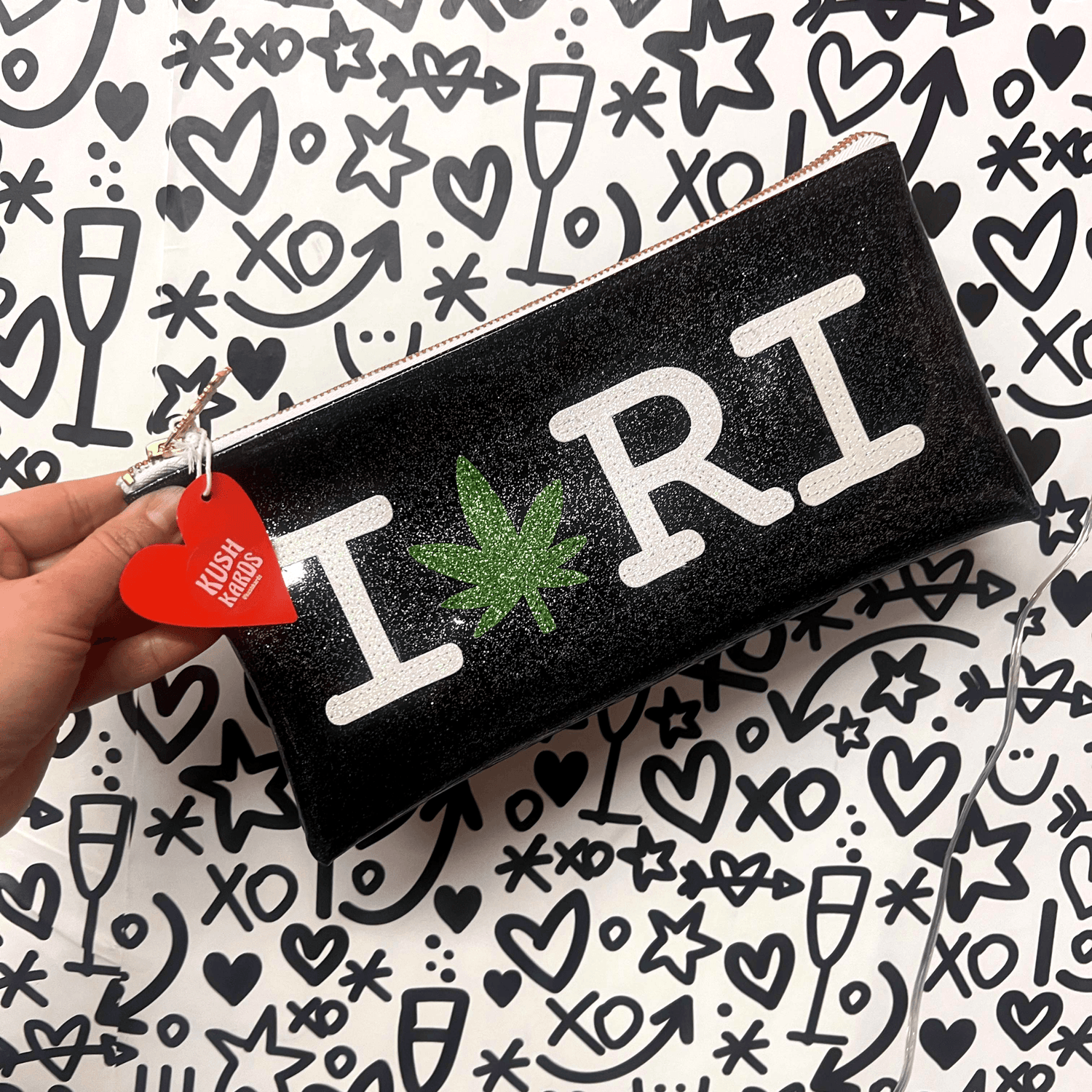 Custom black glitter clutch with &