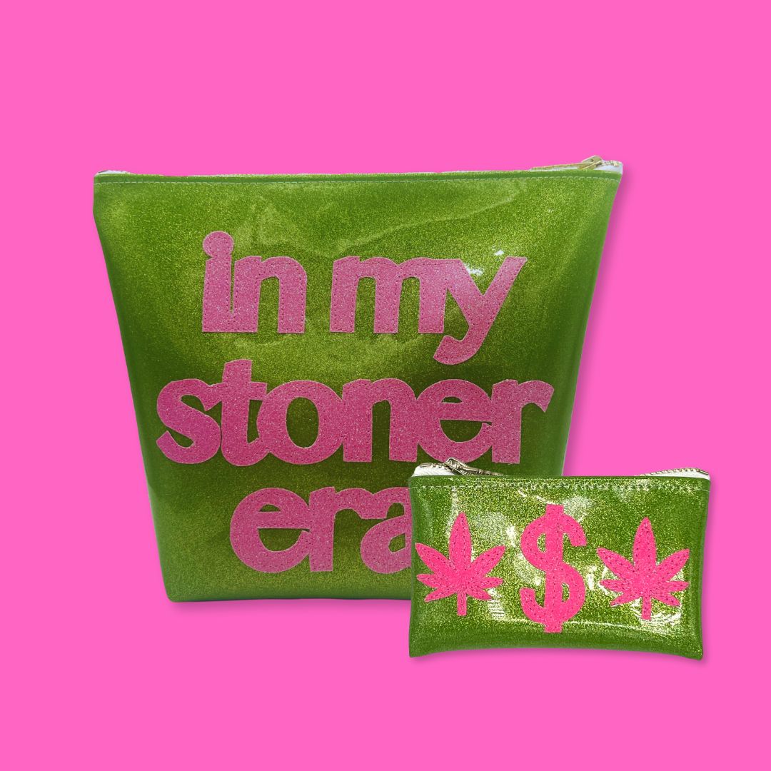 A bold travel set featuring a black “STONER” travel bag and a hot pink & green “Weed Money” keychain clutch—perfect for carrying cannabis essentials with style.
