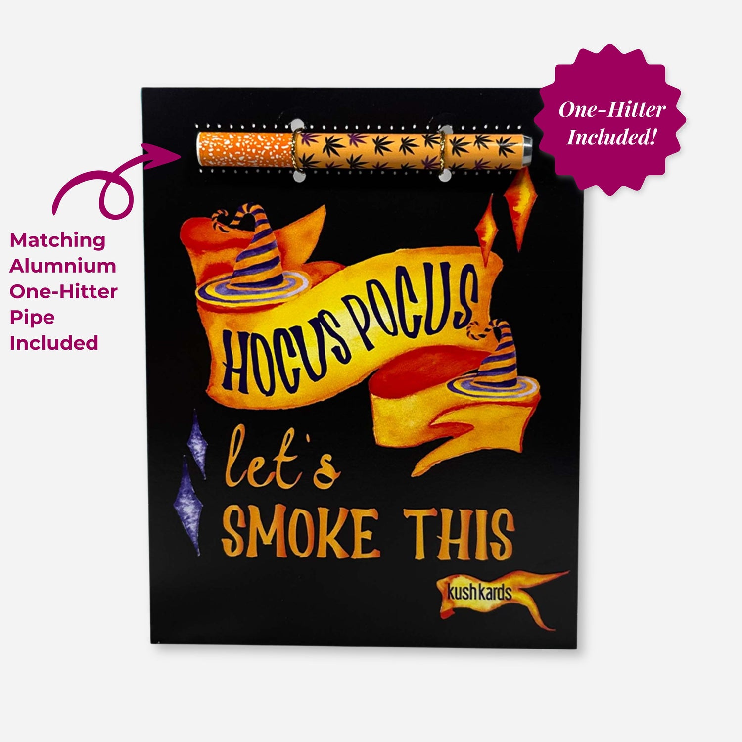 A black greeting card with orange and purple text saying &quot;Hocus Pocus let&