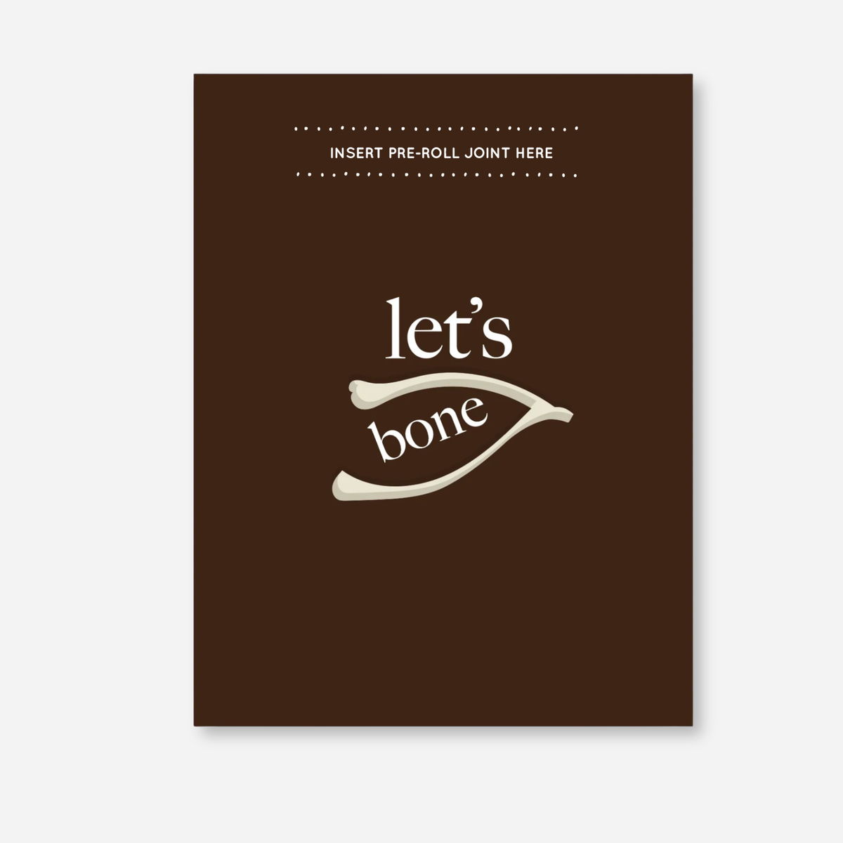 Let’s Bone KushKards greeting card featuring a rich brown background with cream lettering that reads “let’s bone” and a wishbone illustration in the center. A slot near the top is labeled “Insert Pre-Roll Joint Here” for adding a pre-rolled item of choice. 
