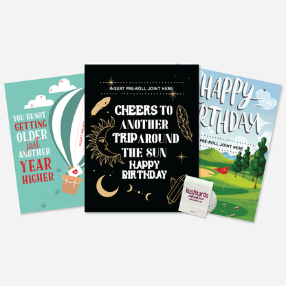 Assorted KushKards birthday set with three cannabis greeting card designs and functional pre-roll slots
