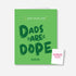 “Green greeting card with bold dark green text that reads ‘Dads Are Dope’. A blank slot is positioned above the text for inserting a pre-roll. A small KushKards-branded matchbook is shown next to the card. The card stands upright on a clean white background.”

