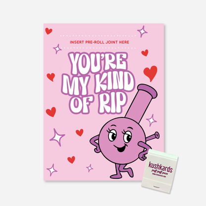 Pink Valentine’s Day KushKard reading “You’re My Kind of Rip” with a playful bong illustration, heart accents, and a built-in slot to insert a pre-rolled item, matchbook included.
