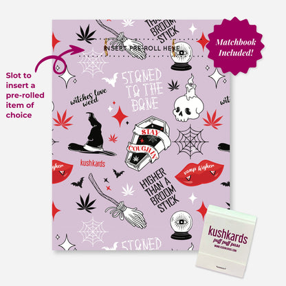 A light purple greeting card with a Halloween-themed pattern of cannabis leaves, witch hats, brooms, skulls with candles, spiderwebs, bats, red lips, and text like &quot;witches love weed,&quot; &quot;STONED TO THE BONE,&quot; &quot;SLAY &amp; COUGH,&quot; and &quot;HIGHER THAN A BROOM STICK.&quot; At the top, there&