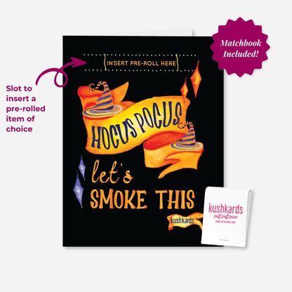 A black greeting card with orange and purple text saying &quot;Hocus Pocus let&