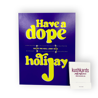 Blue Christmas card with vibrant green text saying 'Have A Dope HoliJAY', perfect for sending festive wishes with a cheeky and playful twist. With matches.