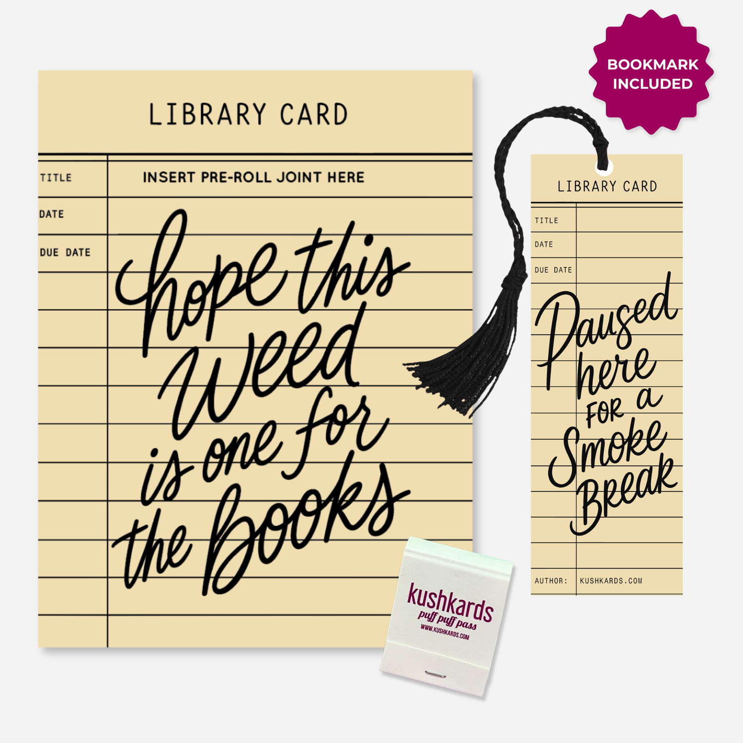 Library card bookmarks and a matchbook set by KushKards, featuring a large cream-colored card with black handwritten text, a smaller matching bookmark with a black tassel, and a small matchbook package on a light gray background.