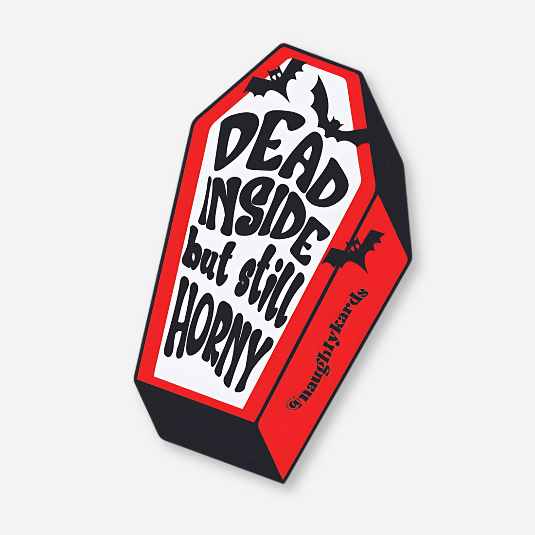 Coffin-shaped sticker with the text &quot;Dead Inside But Still Horny&quot; and bat illustrations.