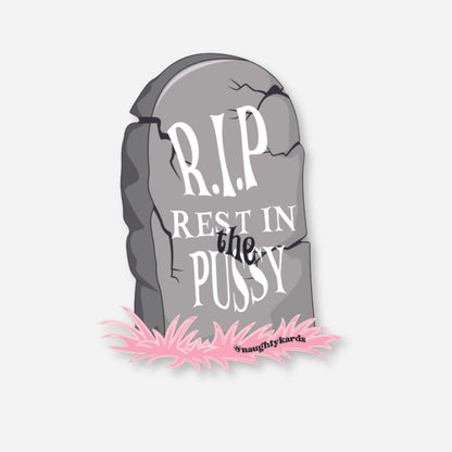 Tombstone-shaped matte sticker with &quot;R.I.P. Rest In The Pussy&quot; and pink grass at the base, adult humor.