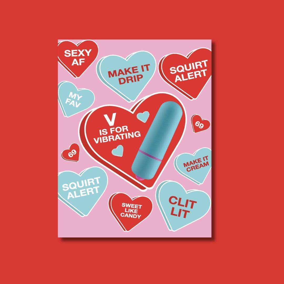 A playful and suggestive greeting card with a pink background, decorated with various candy hearts in shades of blue and red, each featuring flirty and provocative phrases. A large heart in the center displays a blue vibrator with the text 'V is for Vibrating'.