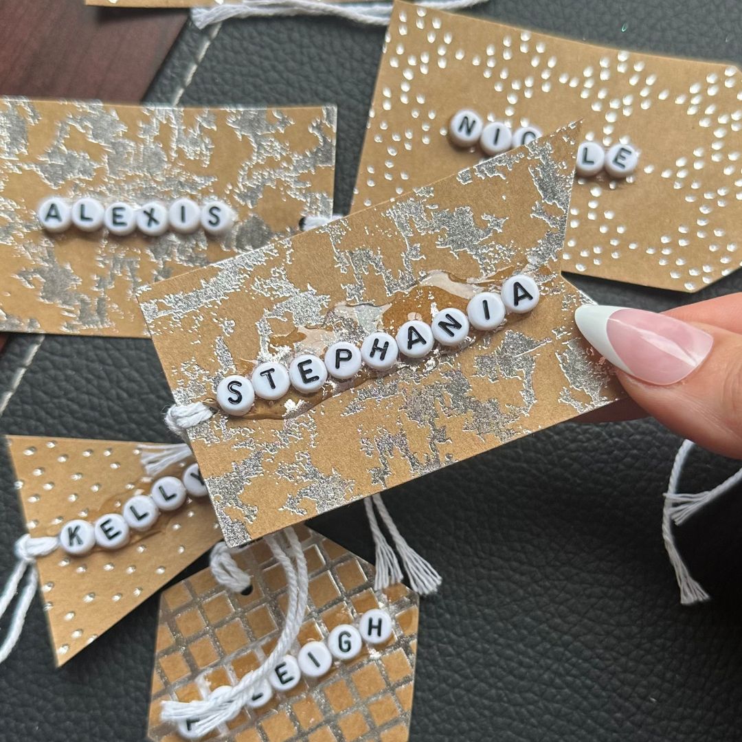 name tags with letter beads as the name 