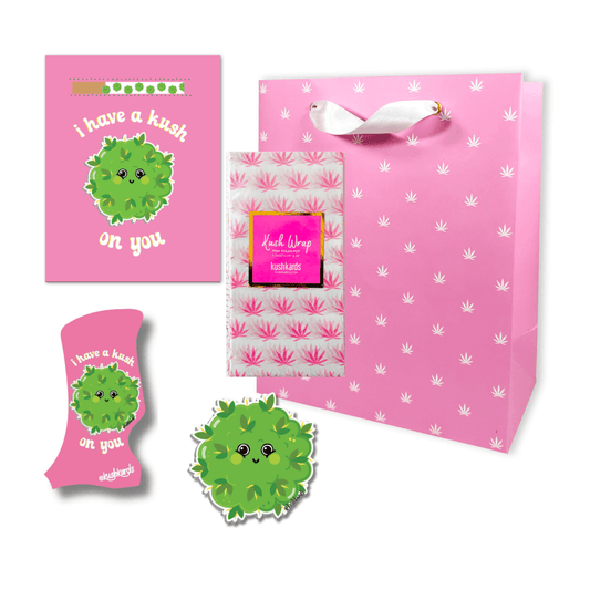 Adorable 'Kush On You Toker Poker Gift Bag Set' with a heartfelt card, versatile lighter case, and cute sticker, all presented in a lovely pink and white themed gift bag.
