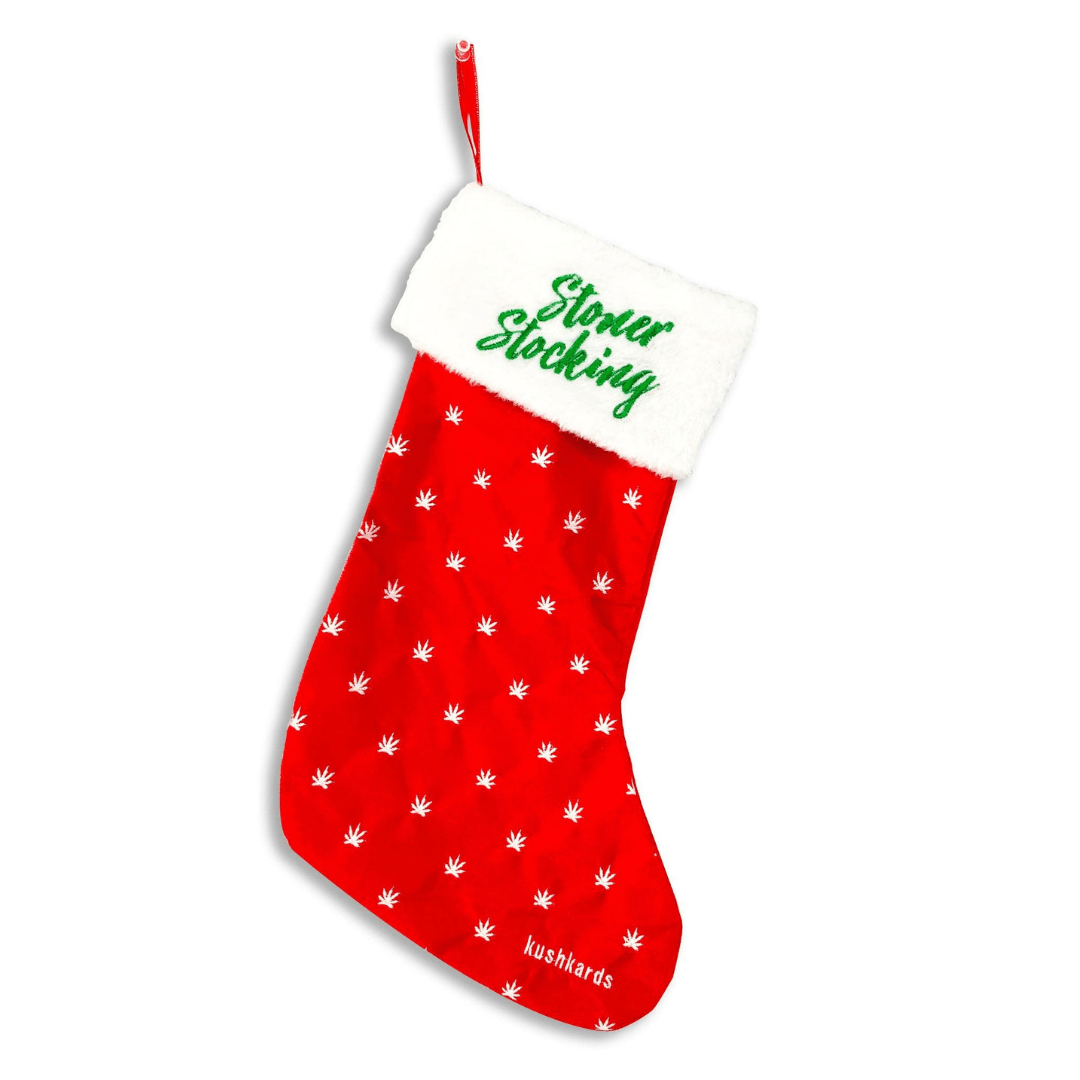 Red 'Stoner Stocking' with white cuff and green embroidery, perfect for a fun and laid-back holiday decoration."