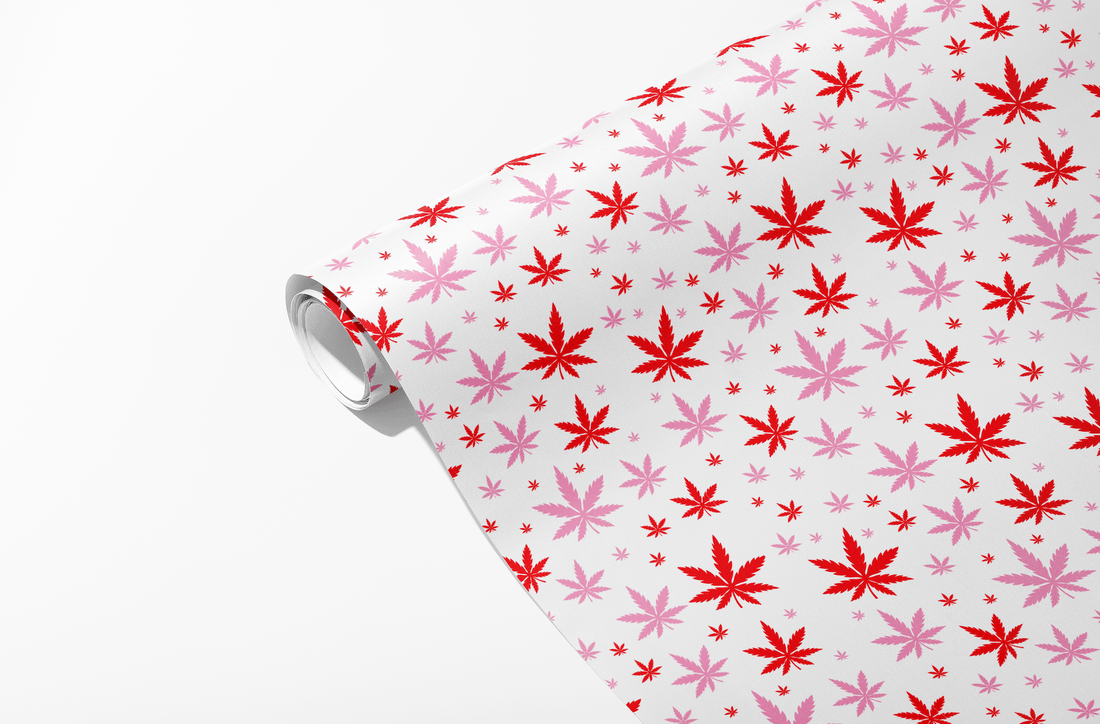 Red and Pink Pot Leaf Wrapping Paper - KushKards 3 sheets per roll at 22&quot; x 29&quot; wide - white background and have pink and red pot leaf print