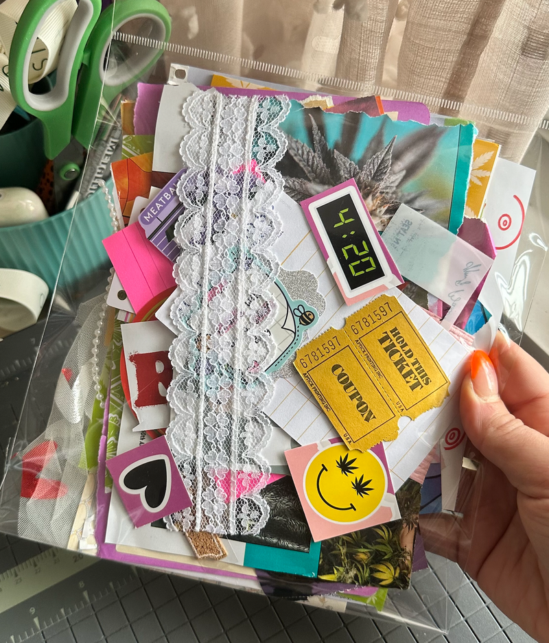 Hand holding a collage of various paper elements with a digital clock showing 4:20.