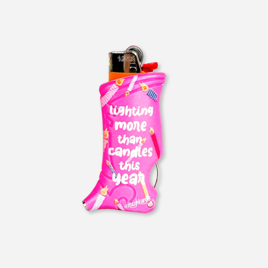 Close-up of the Birthday Candles Toker Poker Lighter Case, featuring a playful pink design with candle and flame motifs, designed to snugly fit a Bic lighter.