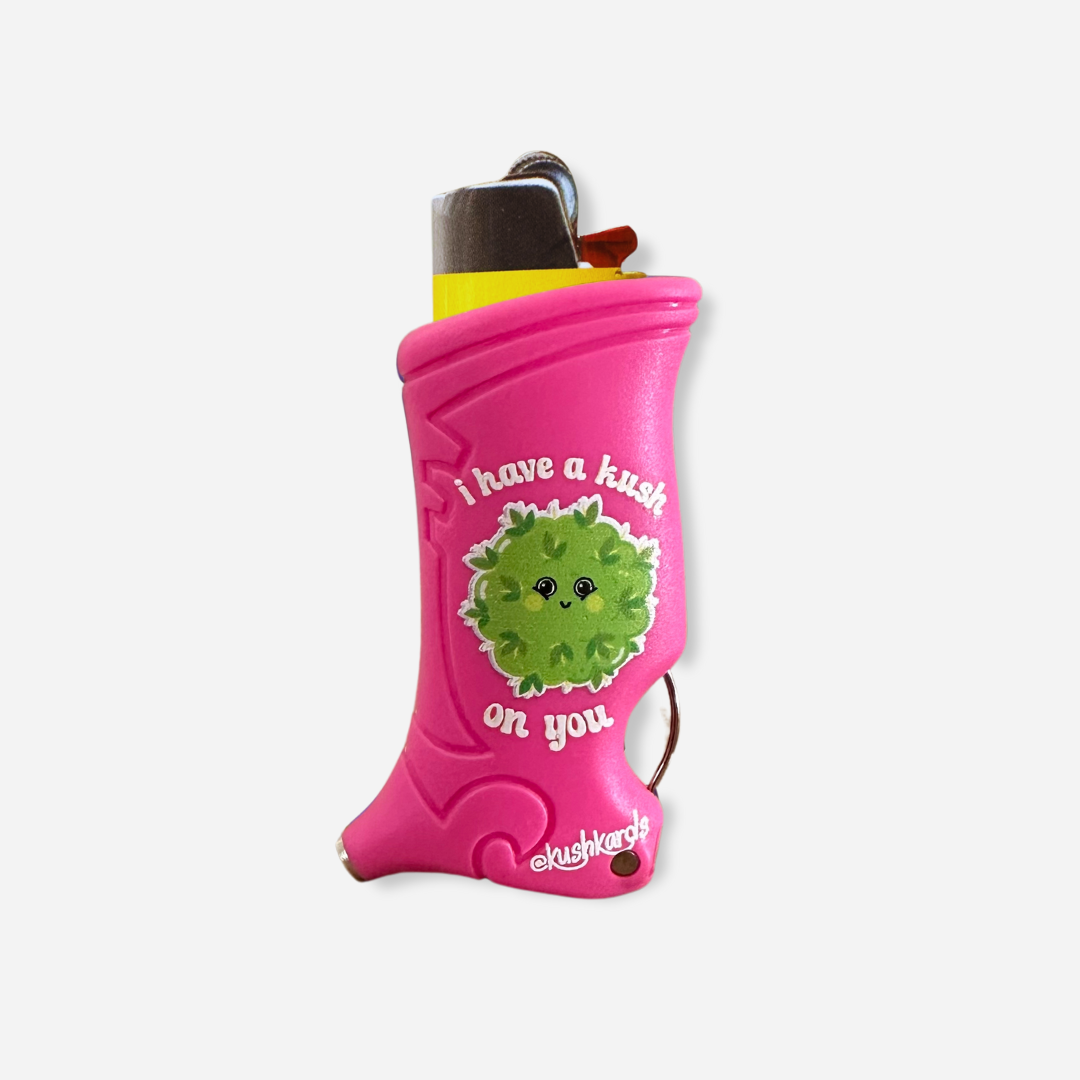 Charming pink 'Kush On You Toker Poker Lighter Case' with a cute cannabis leaf, combining fun and functionality for a perfect smoking session accessory.
