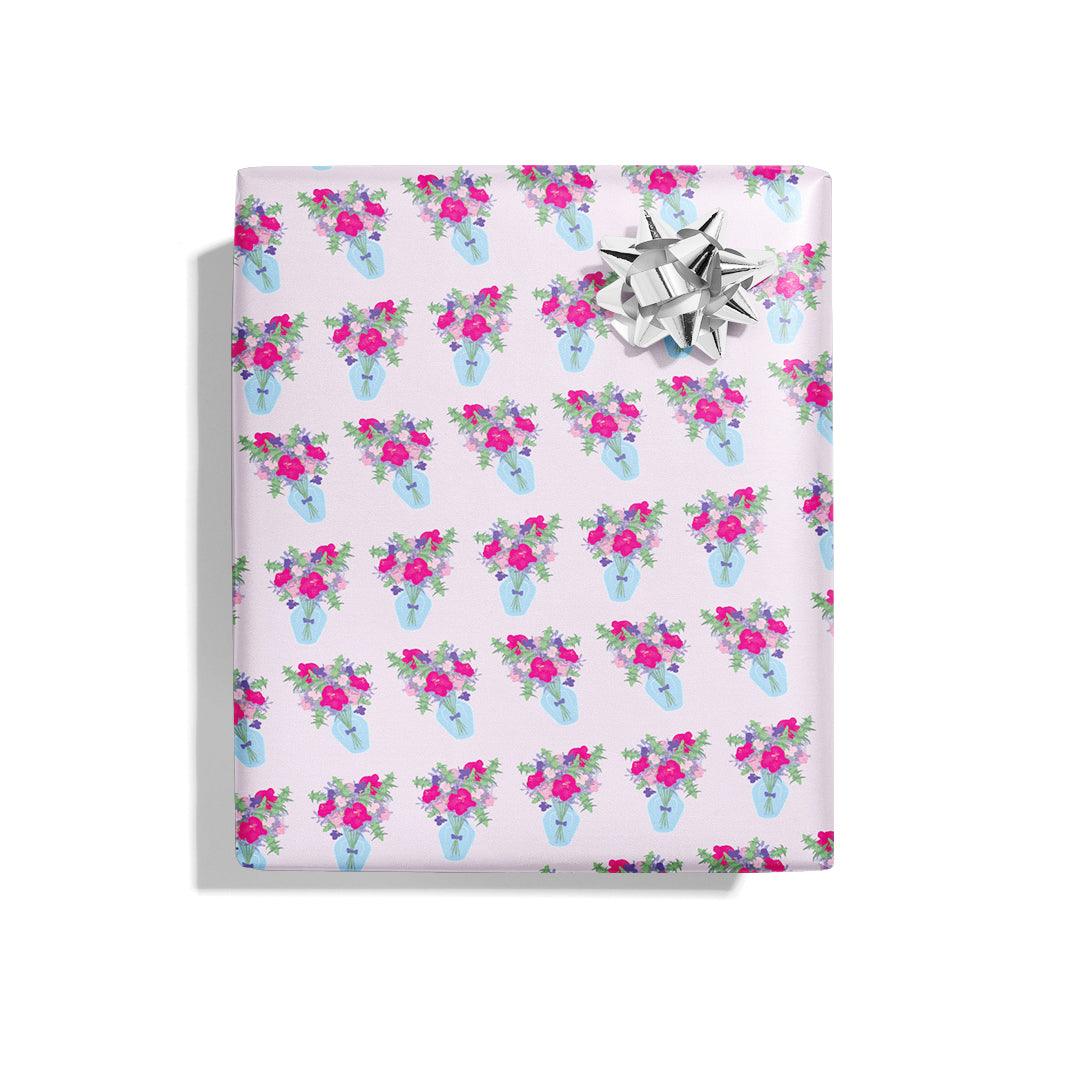Flower Wrapping Paper that comes 3 sheets in a roll and 22&quot; x 29&quot; wide and purple background and flowers in a vase print