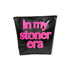 Black travel bag with pink text &