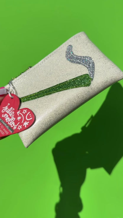 video of smoking joint keychain clutch on green background 
