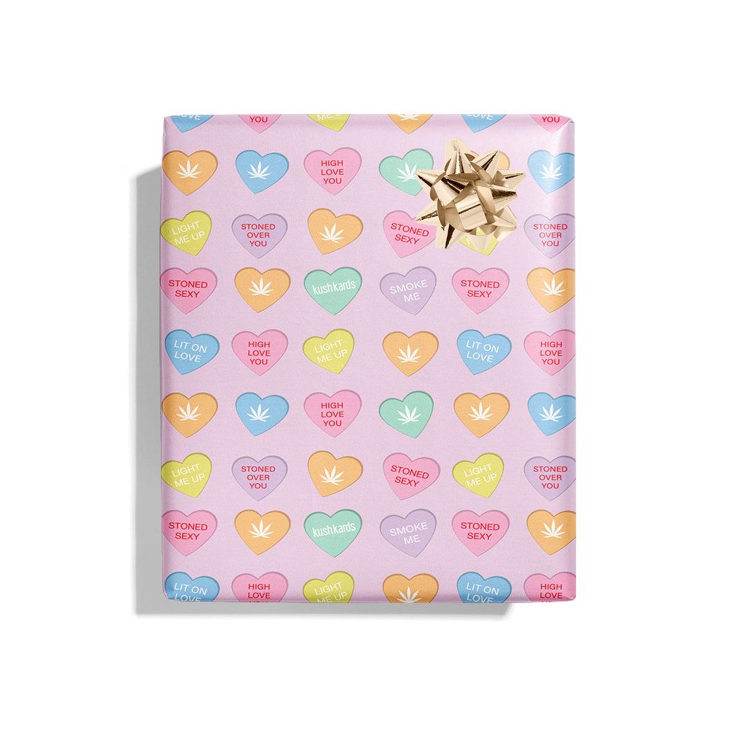Stoner Sweeties Wrapping Paper - KushKards 22" x 29" wide and has 3 sheets per roll with cannabis themed sweat heart sayings