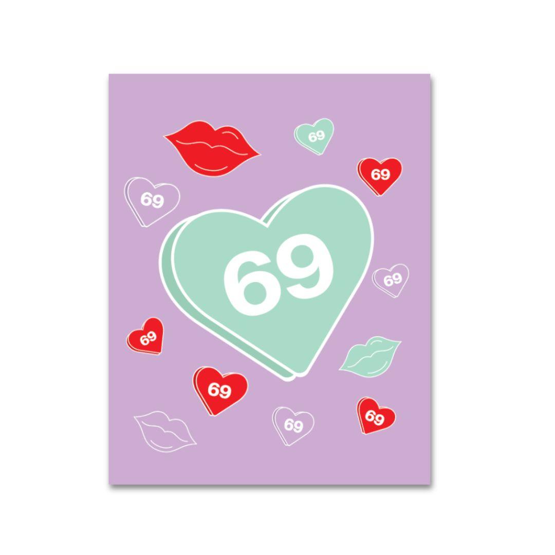 A romantic yet playful greeting card featuring a lilac background with a large heart saying '69' surrounded by smaller hearts and lips, some with the number '69', creating a flirty and suggestive love-themed card.