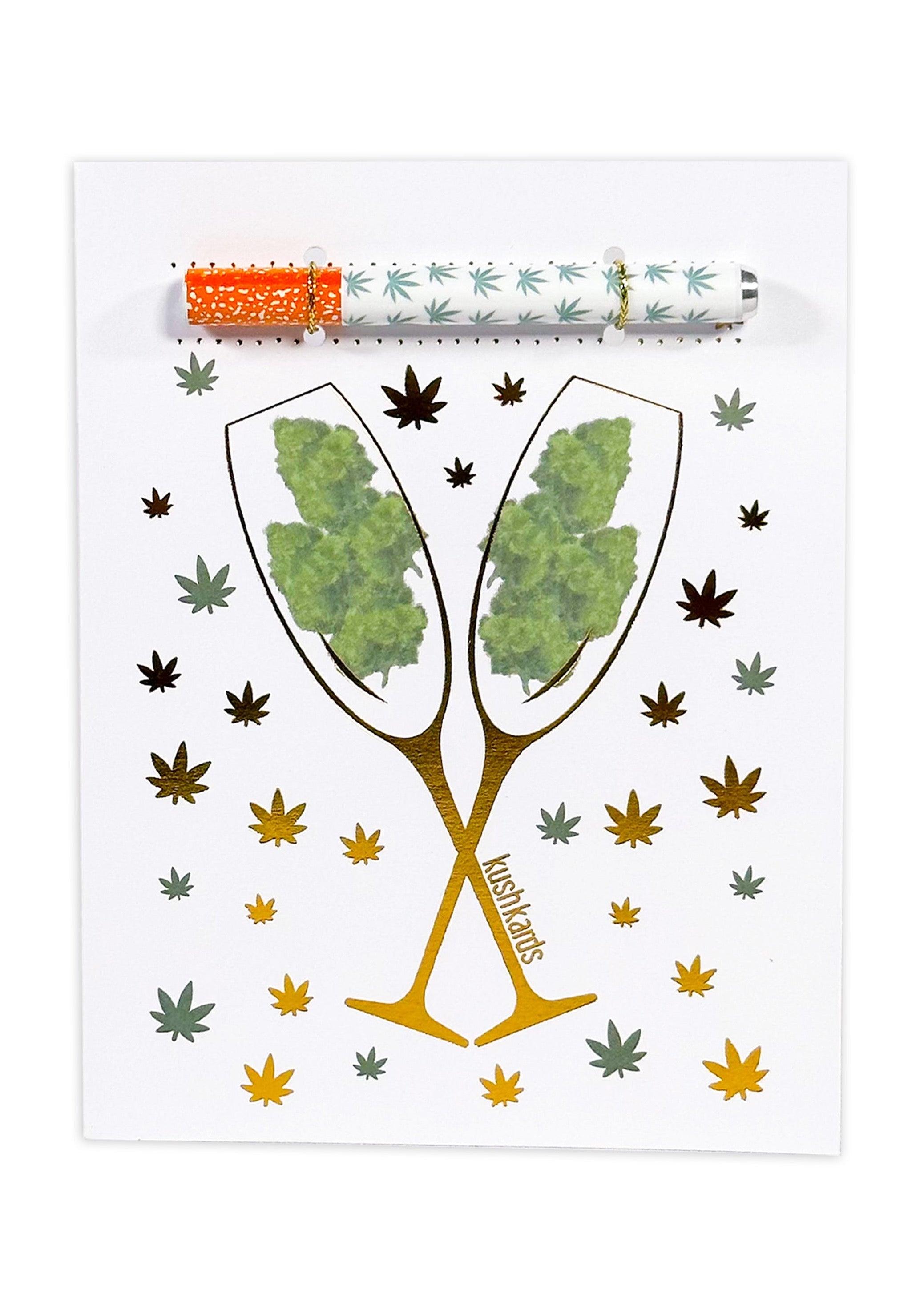 🥂 Congrats Champagne Buds Card - KushKards with 2 champagne glassed filled with nugs on a white background with gold and green pot leafs and a matching one hitter pipe
